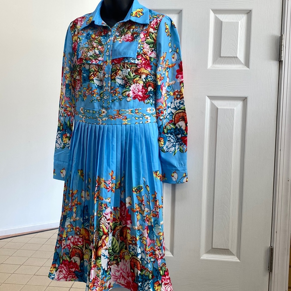 Blue floral dress with collar, button front , and invisible side zipper.